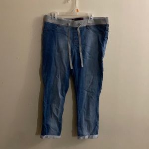 Medium washed jeans, rolled up